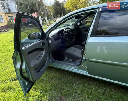 Зелений Шевроле Лачетті, об'ємом двигуна 1.8 л та пробігом 225 тис. км за 3950 $, фото 8 на Automoto.ua