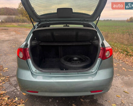 Зеленый Шевроле Лачетти, объемом двигателя 1.8 л и пробегом 228 тыс. км за 3400 $, фото 10 на Automoto.ua