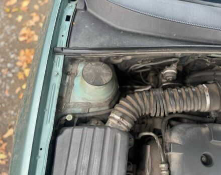 Зеленый Шевроле Лачетти, объемом двигателя 1.8 л и пробегом 227 тыс. км за 3600 $, фото 12 на Automoto.ua