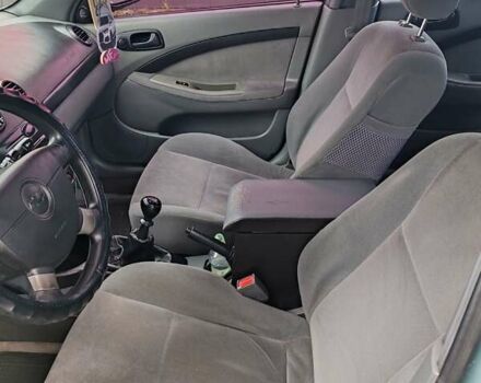 Зеленый Шевроле Лачетти, объемом двигателя 1.6 л и пробегом 277 тыс. км за 3750 $, фото 10 на Automoto.ua