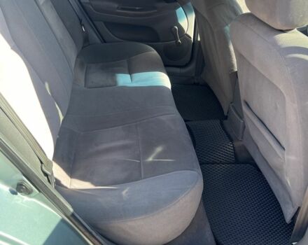 Зеленый Шевроле Лачетти, объемом двигателя 1.6 л и пробегом 248 тыс. км за 3550 $, фото 16 на Automoto.ua