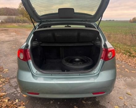 Зеленый Шевроле Лачетти, объемом двигателя 1.8 л и пробегом 227 тыс. км за 3600 $, фото 13 на Automoto.ua