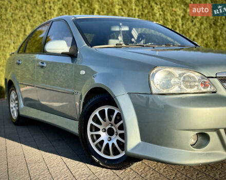 Зелений Шевроле Лачетті, об'ємом двигуна 1.8 л та пробігом 296 тис. км за 4200 $, фото 14 на Automoto.ua