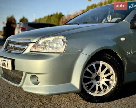 Зелений Шевроле Лачетті, об'ємом двигуна 1.8 л та пробігом 296 тис. км за 4200 $, фото 10 на Automoto.ua