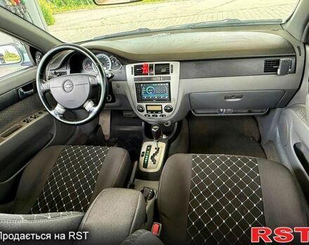 Зеленый Шевроле Лачетти, объемом двигателя 1.8 л и пробегом 190 тыс. км за 3300 $, фото 6 на Automoto.ua