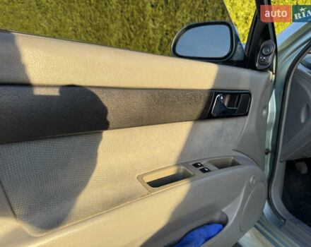 Зелений Шевроле Лачетті, об'ємом двигуна 1.8 л та пробігом 296 тис. км за 4200 $, фото 41 на Automoto.ua