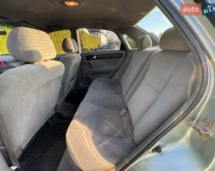 Зелений Шевроле Лачетті, об'ємом двигуна 1.8 л та пробігом 296 тис. км за 4200 $, фото 33 на Automoto.ua