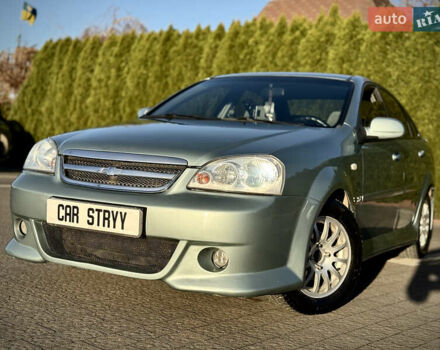 Зелений Шевроле Лачетті, об'ємом двигуна 1.8 л та пробігом 296 тис. км за 4200 $, фото 9 на Automoto.ua