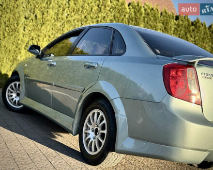 Зелений Шевроле Лачетті, об'ємом двигуна 1.8 л та пробігом 296 тис. км за 4200 $, фото 19 на Automoto.ua