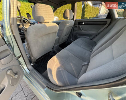 Зелений Шевроле Лачетті, об'ємом двигуна 1.8 л та пробігом 296 тис. км за 4200 $, фото 34 на Automoto.ua