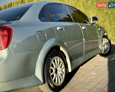 Зелений Шевроле Лачетті, об'ємом двигуна 1.8 л та пробігом 296 тис. км за 4200 $, фото 23 на Automoto.ua