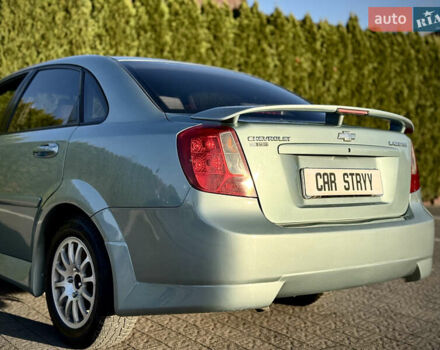 Зелений Шевроле Лачетті, об'ємом двигуна 1.8 л та пробігом 296 тис. км за 4200 $, фото 18 на Automoto.ua