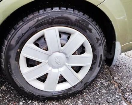 Зелений Шевроле Лачетті, об'ємом двигуна 1.8 л та пробігом 388 тис. км за 5399 $, фото 15 на Automoto.ua