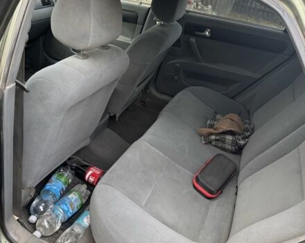 Зелений Шевроле Лачетті, об'ємом двигуна 1.8 л та пробігом 232 тис. км за 2500 $, фото 6 на Automoto.ua