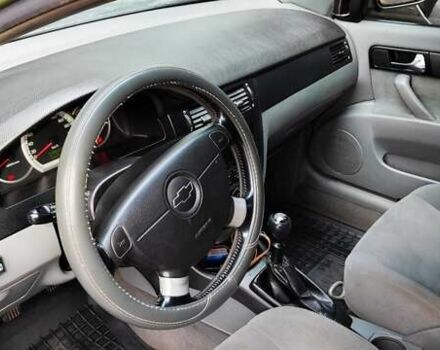 Зелений Шевроле Лачетті, об'ємом двигуна 1.8 л та пробігом 388 тис. км за 5399 $, фото 7 на Automoto.ua