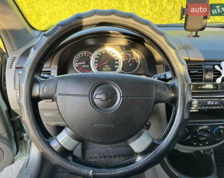 Зелений Шевроле Лачетті, об'ємом двигуна 1.8 л та пробігом 296 тис. км за 4200 $, фото 44 на Automoto.ua