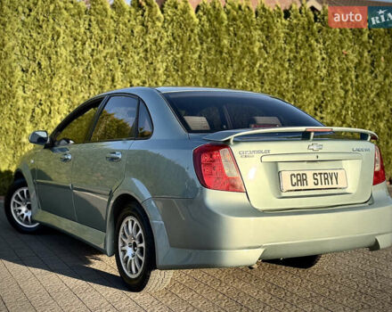 Зелений Шевроле Лачетті, об'ємом двигуна 1.8 л та пробігом 296 тис. км за 4200 $, фото 16 на Automoto.ua