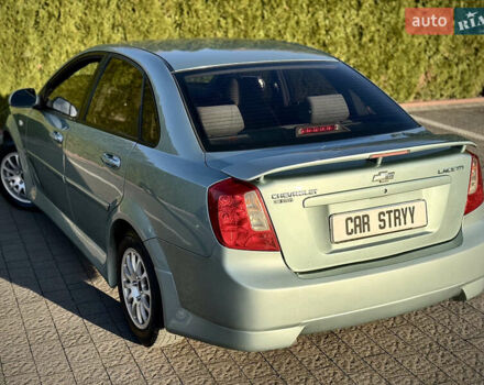 Зелений Шевроле Лачетті, об'ємом двигуна 1.8 л та пробігом 296 тис. км за 4200 $, фото 20 на Automoto.ua