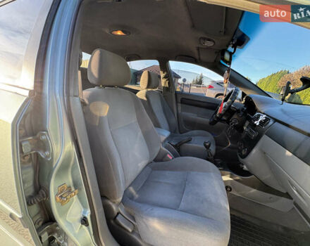 Зелений Шевроле Лачетті, об'ємом двигуна 1.8 л та пробігом 296 тис. км за 4200 $, фото 24 на Automoto.ua