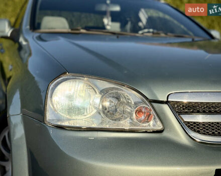 Зелений Шевроле Лачетті, об'ємом двигуна 1.8 л та пробігом 296 тис. км за 4200 $, фото 15 на Automoto.ua