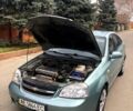Зелений Шевроле Лачетті, об'ємом двигуна 1.8 л та пробігом 152 тис. км за 4200 $, фото 12 на Automoto.ua