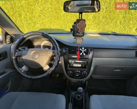 Зелений Шевроле Лачетті, об'ємом двигуна 1.8 л та пробігом 296 тис. км за 4200 $, фото 29 на Automoto.ua