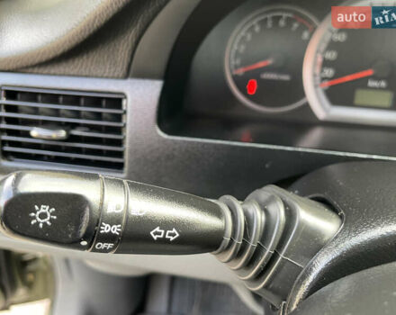 Зелений Шевроле Лачетті, об'ємом двигуна 1.8 л та пробігом 104 тис. км за 5200 $, фото 28 на Automoto.ua