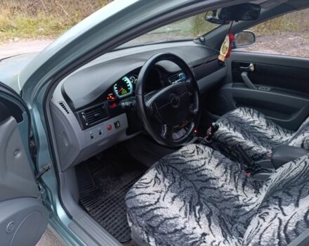 Зеленый Шевроле Лачетти, объемом двигателя 1.8 л и пробегом 208 тыс. км за 3800 $, фото 12 на Automoto.ua