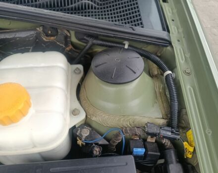 Зеленый Шевроле Лачетти, объемом двигателя 1.6 л и пробегом 253 тыс. км за 3650 $, фото 9 на Automoto.ua