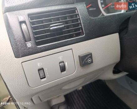 Зелений Шевроле Лачетті, об'ємом двигуна 1.6 л та пробігом 280 тис. км за 3499 $, фото 11 на Automoto.ua