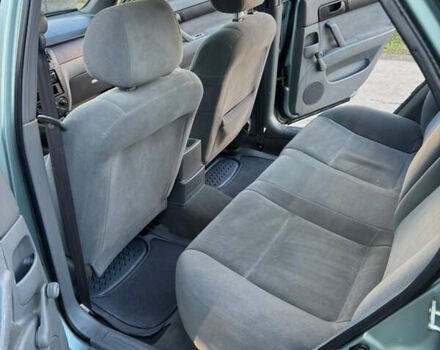 Зеленый Шевроле Лачетти, объемом двигателя 1.6 л и пробегом 287 тыс. км за 3100 $, фото 13 на Automoto.ua