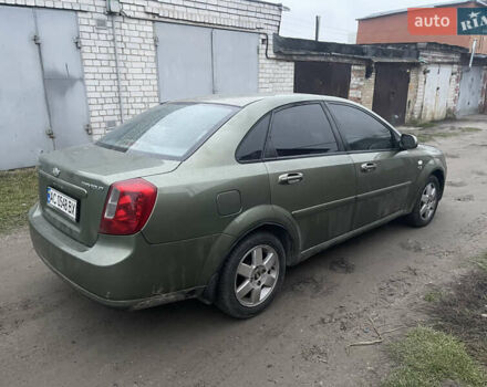 Зелений Шевроле Лачетті, об'ємом двигуна 1.8 л та пробігом 275 тис. км за 2300 $, фото 5 на Automoto.ua