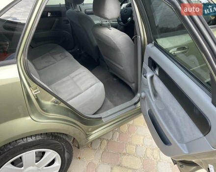 Зелений Шевроле Лачетті, об'ємом двигуна 1.8 л та пробігом 104 тис. км за 5200 $, фото 46 на Automoto.ua