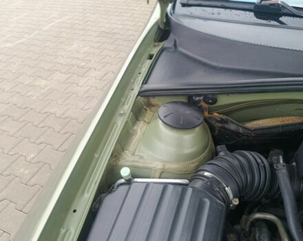 Зеленый Шевроле Лачетти, объемом двигателя 1.6 л и пробегом 253 тыс. км за 3650 $, фото 10 на Automoto.ua