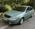 Зеленый Шевроле Лачетти, объемом двигателя 1.8 л и пробегом 318 тыс. км за 4399 $, фото 1 на Automoto.ua