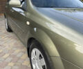 Зелений Шевроле Лачетті, об'ємом двигуна 1.8 л та пробігом 104 тис. км за 5200 $, фото 11 на Automoto.ua