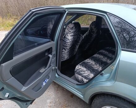 Зеленый Шевроле Лачетти, объемом двигателя 1.8 л и пробегом 208 тыс. км за 3800 $, фото 8 на Automoto.ua