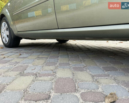 Зелений Шевроле Лачетті, об'ємом двигуна 1.8 л та пробігом 104 тис. км за 5200 $, фото 18 на Automoto.ua