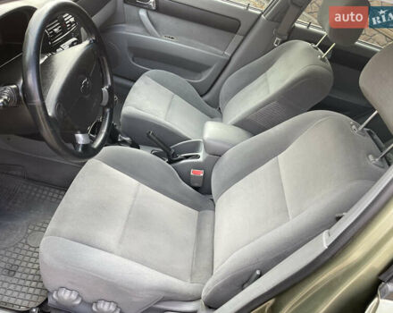 Зелений Шевроле Лачетті, об'ємом двигуна 1.8 л та пробігом 104 тис. км за 5200 $, фото 23 на Automoto.ua