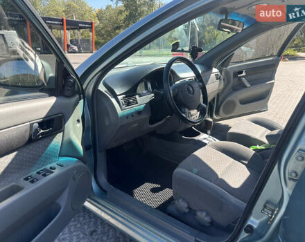 Зелений Шевроле Лачетті, об'ємом двигуна 1.8 л та пробігом 222 тис. км за 4000 $, фото 7 на Automoto.ua