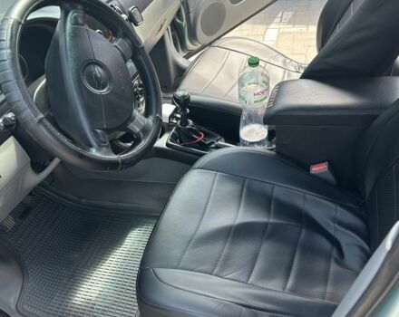 Зеленый Шевроле Лачетти, объемом двигателя 1.6 л и пробегом 301 тыс. км за 3650 $, фото 5 на Automoto.ua