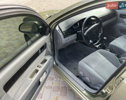 Зелений Шевроле Лачетті, об'ємом двигуна 1.8 л та пробігом 104 тис. км за 5200 $, фото 21 на Automoto.ua