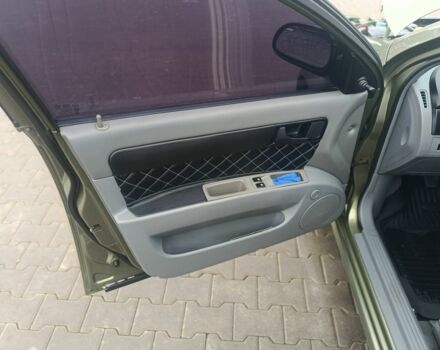 Зеленый Шевроле Лачетти, объемом двигателя 1.6 л и пробегом 253 тыс. км за 3650 $, фото 7 на Automoto.ua