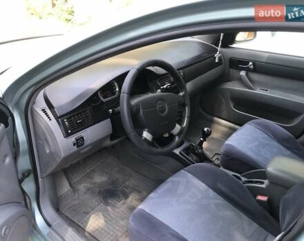 Зеленый Шевроле Лачетти, объемом двигателя 1.8 л и пробегом 249 тыс. км за 4050 $, фото 12 на Automoto.ua