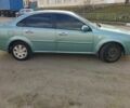 Зеленый Шевроле Лачетти, объемом двигателя 1.8 л и пробегом 235 тыс. км за 4003 $, фото 1 на Automoto.ua