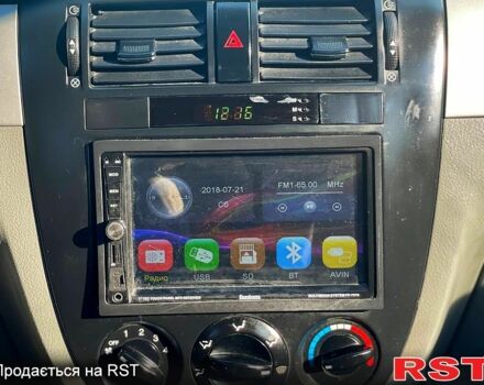 Зеленый Шевроле Лачетти, объемом двигателя 1.6 л и пробегом 154 тыс. км за 4500 $, фото 11 на Automoto.ua