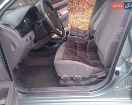 Зелений Шевроле Лачетті, об'ємом двигуна 1.6 л та пробігом 255 тис. км за 3999 $, фото 31 на Automoto.ua