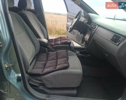 Зелений Шевроле Лачетті, об'ємом двигуна 1.6 л та пробігом 255 тис. км за 3999 $, фото 25 на Automoto.ua