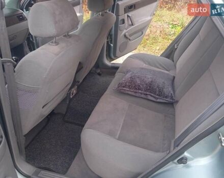 Зелений Шевроле Лачетті, об'ємом двигуна 1.6 л та пробігом 255 тис. км за 3999 $, фото 33 на Automoto.ua