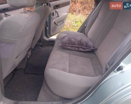 Зелений Шевроле Лачетті, об'ємом двигуна 1.6 л та пробігом 255 тис. км за 3999 $, фото 29 на Automoto.ua